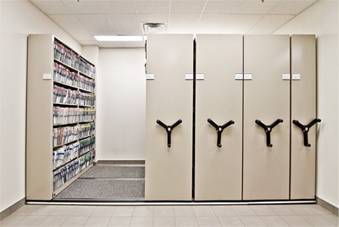 High density mobile shelving system maximizing storage space in UAE warehouse